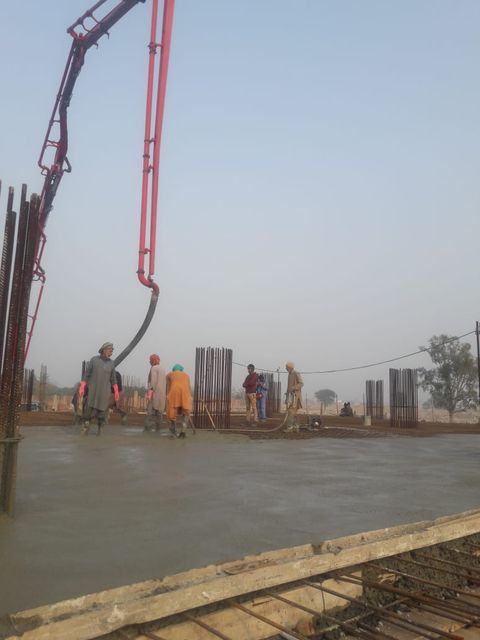 Phase 2 concrete pump pouring a foundation slab