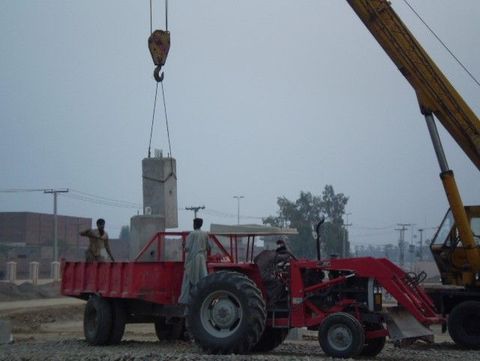 Precast concrete pole being delivered to the Phase 2 site